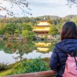 Female solo traveler at a temple in Kyoto