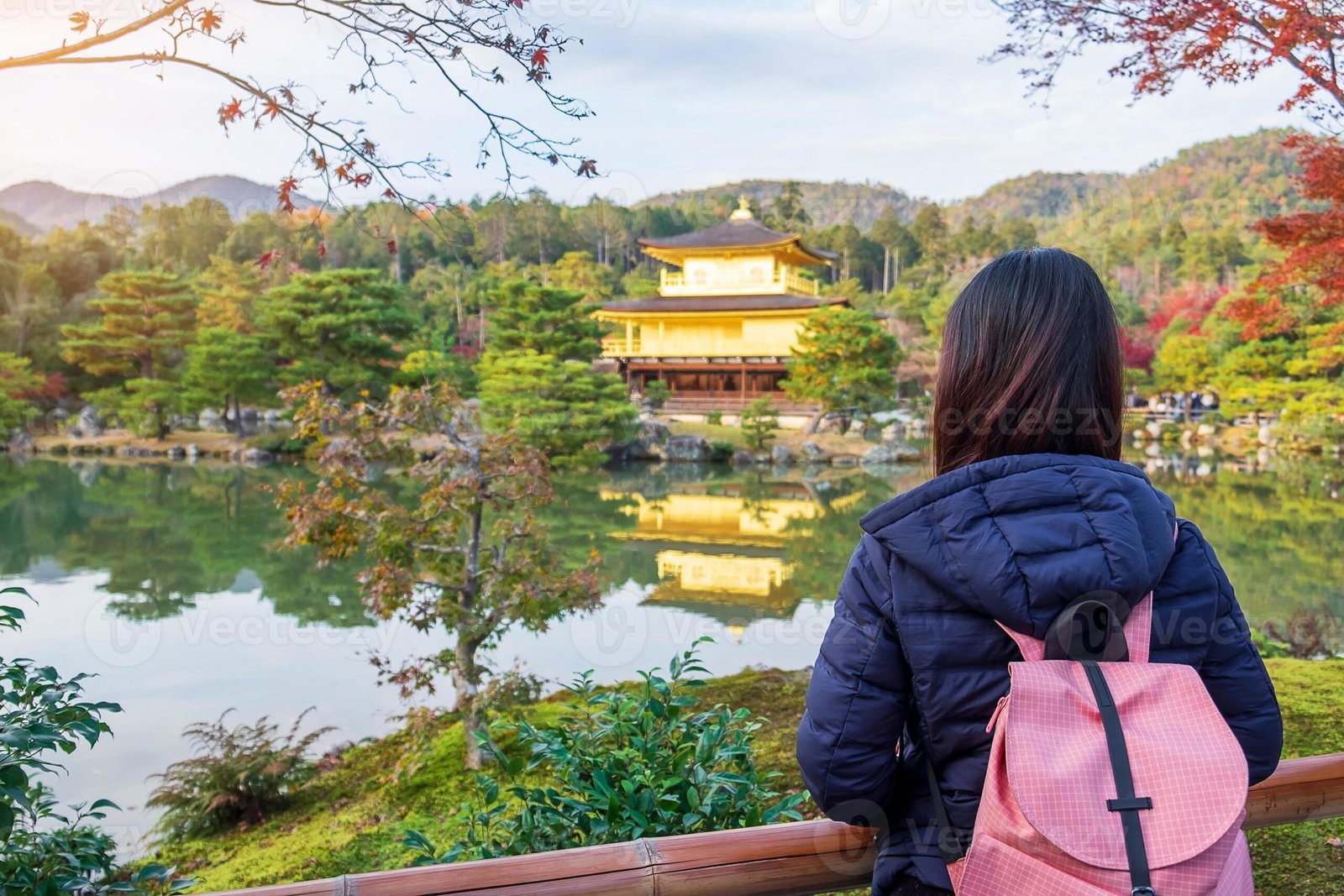 Female solo traveler at a temple in Kyoto scaled