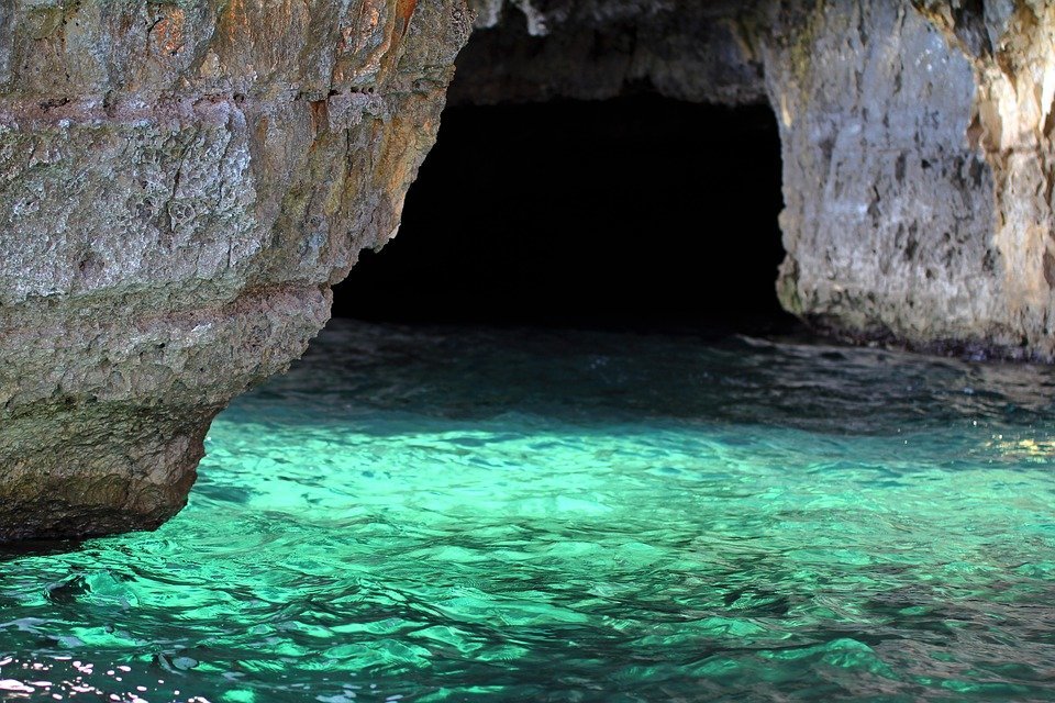 A Secret Mediterranean Beach With Emerald Waters and Hidden Caves You Need to Visit 2