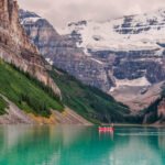 small vecteezy red boat in lake in banff national park 1226097 small
