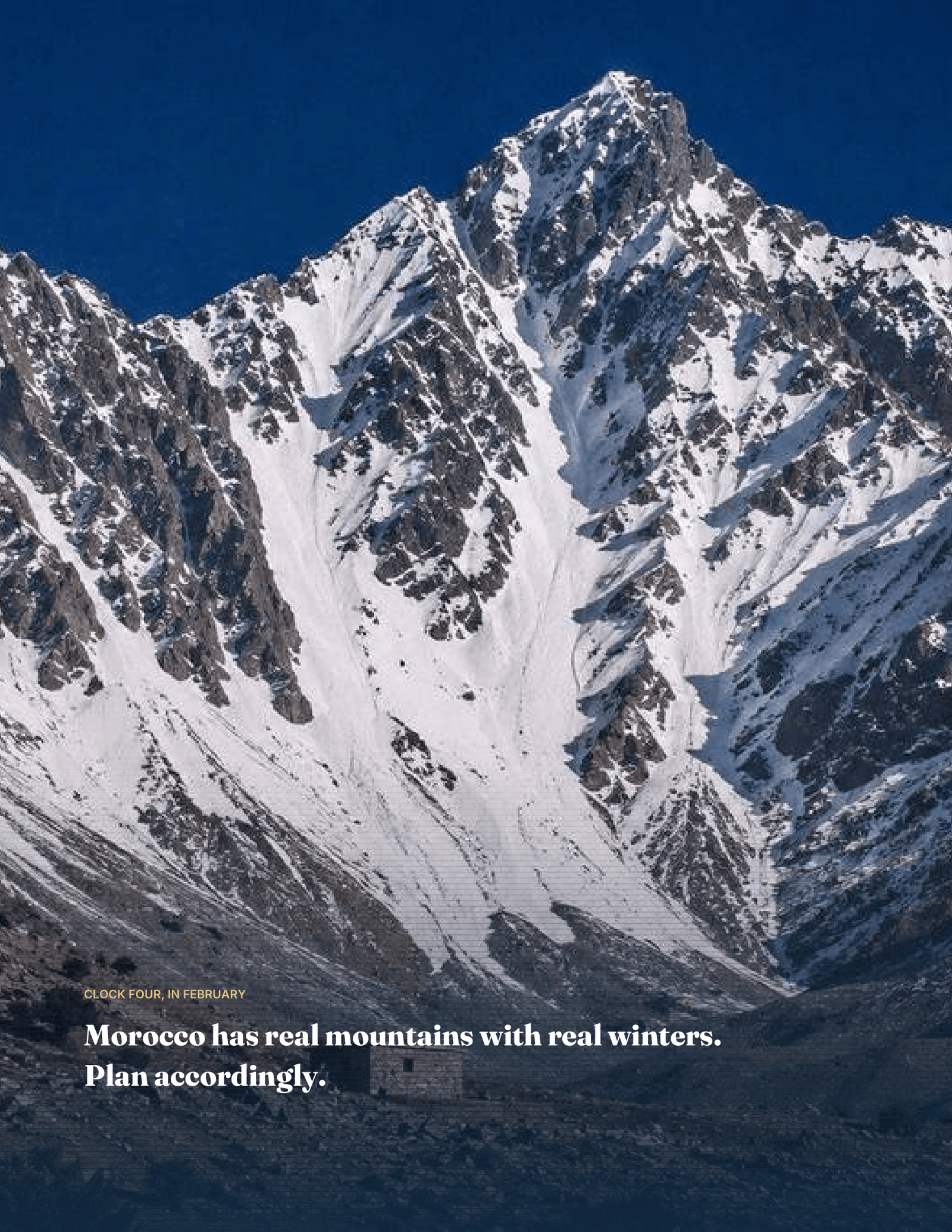 A spread showing the snow-covered High Atlas above a line about Morocco having real mountains with real winters