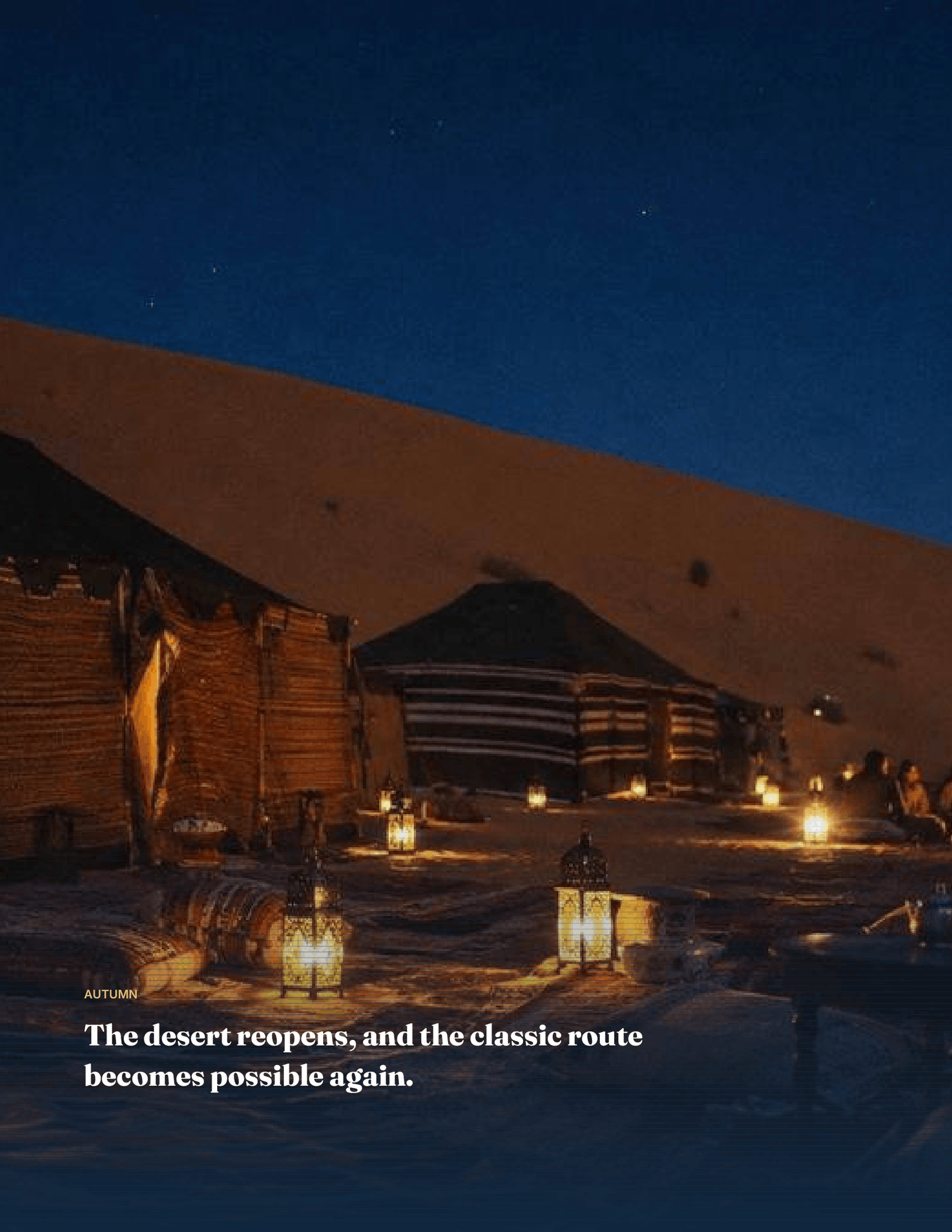 Spread from the guide showing a lantern-lit desert camp at night